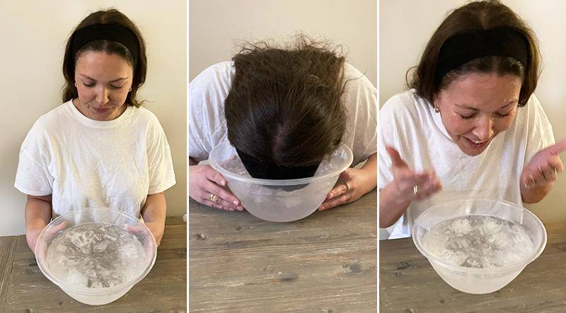 Woman applying ice cube treatment for open pores on face