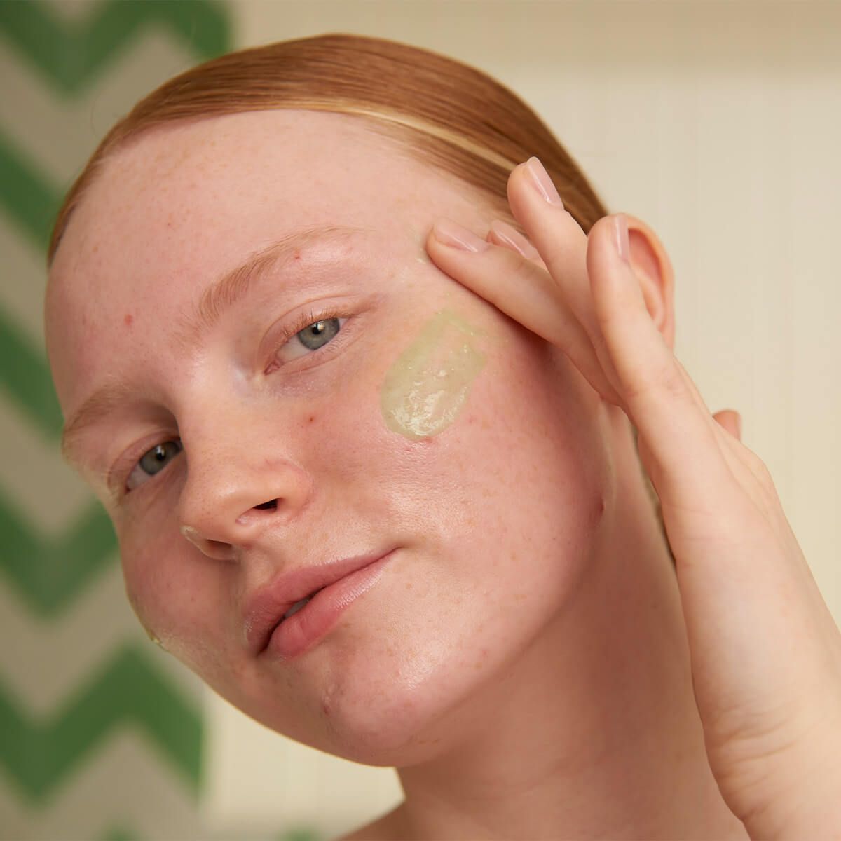 Woman following summer skincare routine to prevent open pores. Woman following summer skincare routine to prevent open pores.