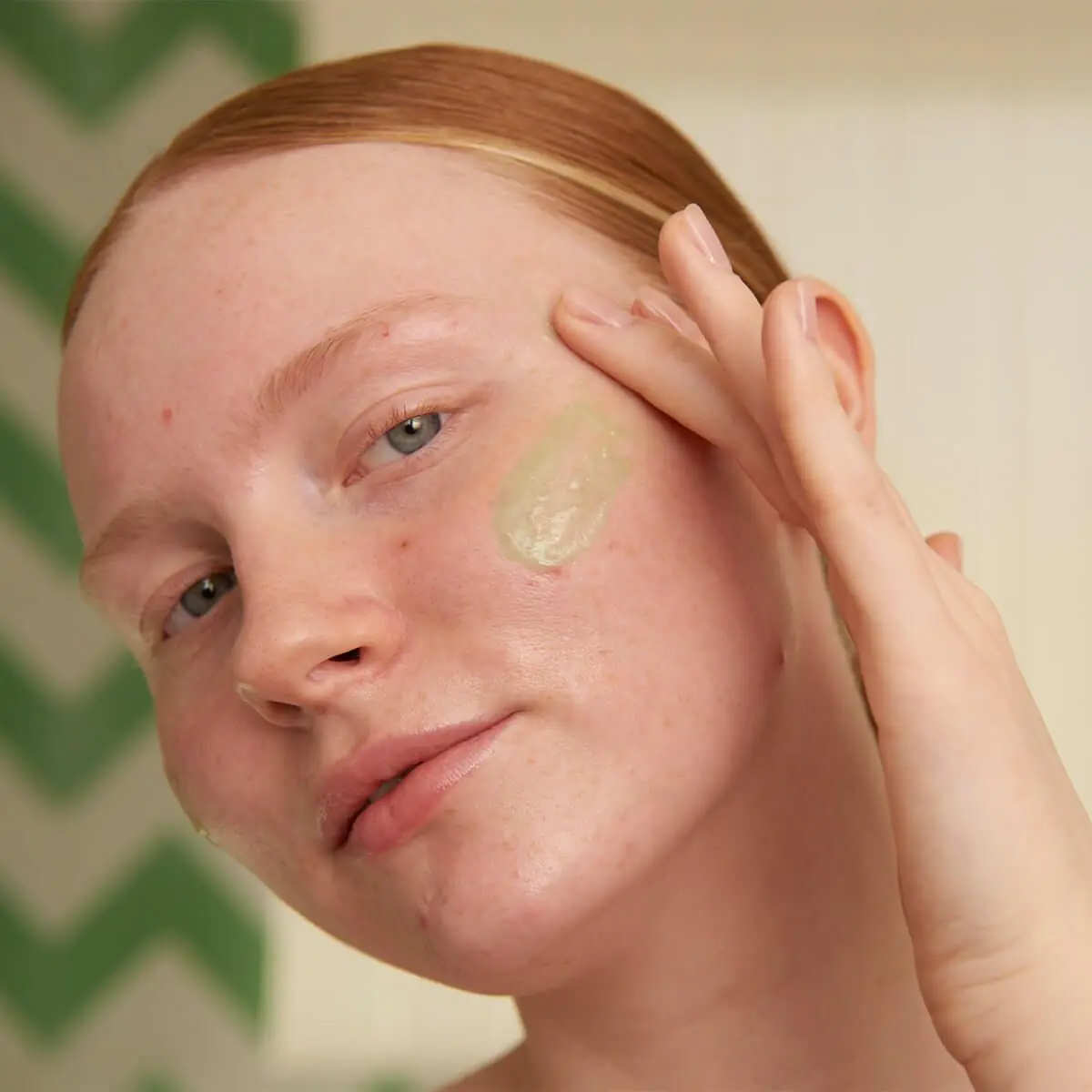 Woman following summer skincare routine to prevent open pores. Woman following summer skincare routine to prevent open pores.