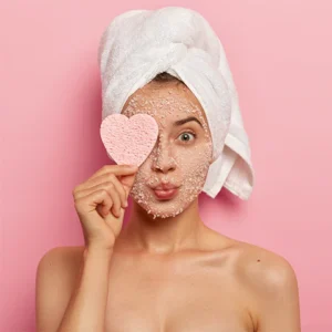 Exfoliation_In_Summers_480x480 Woman following summer skincare routine to prevent open pores.