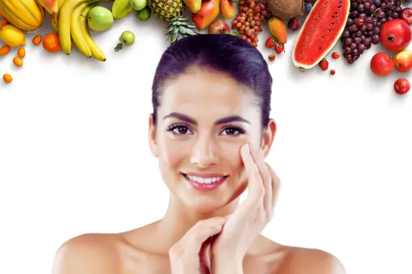Woman with healthy glowing skin after eating pore-reducing foods naturally.