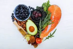 images - 2026-07-30T183714.452 Woman eating healthy foods during her menstrual cycle.